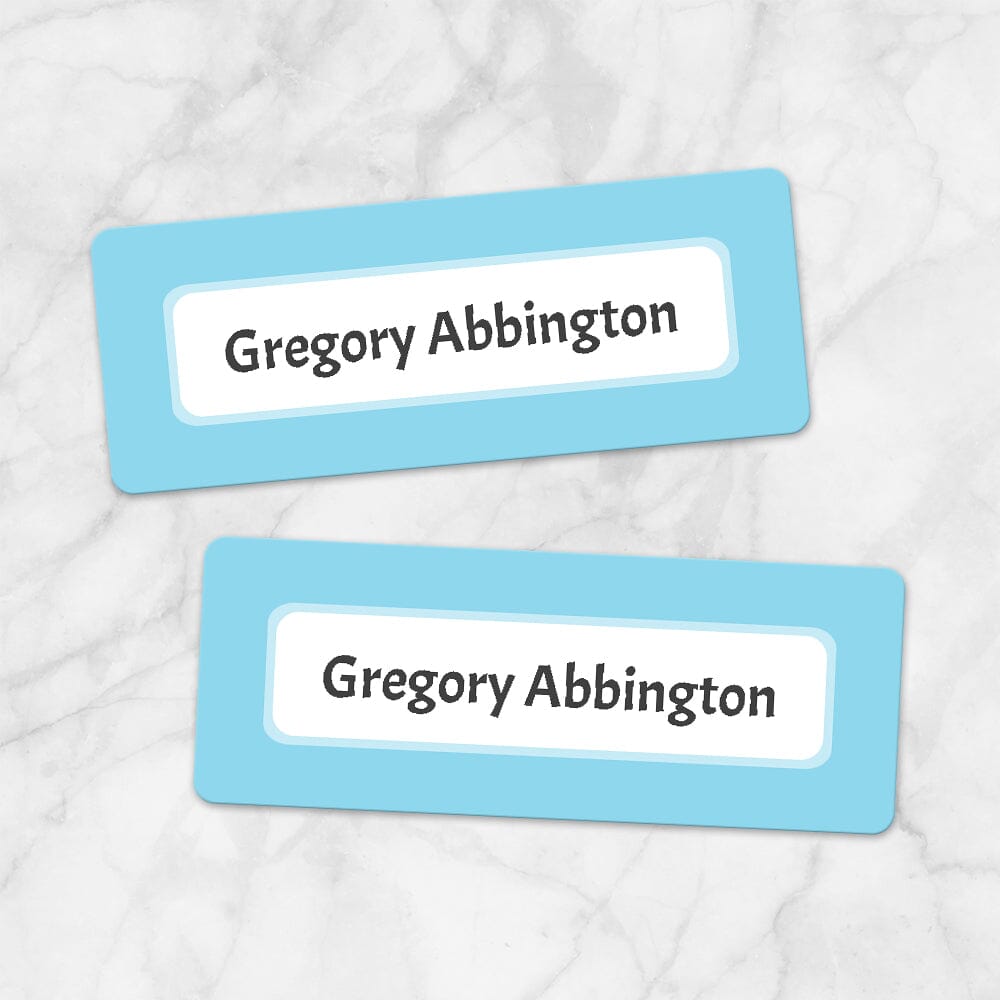 Printable Blue Border Name Labels for School Supplies at Printable Planning. Example of 2 labels.