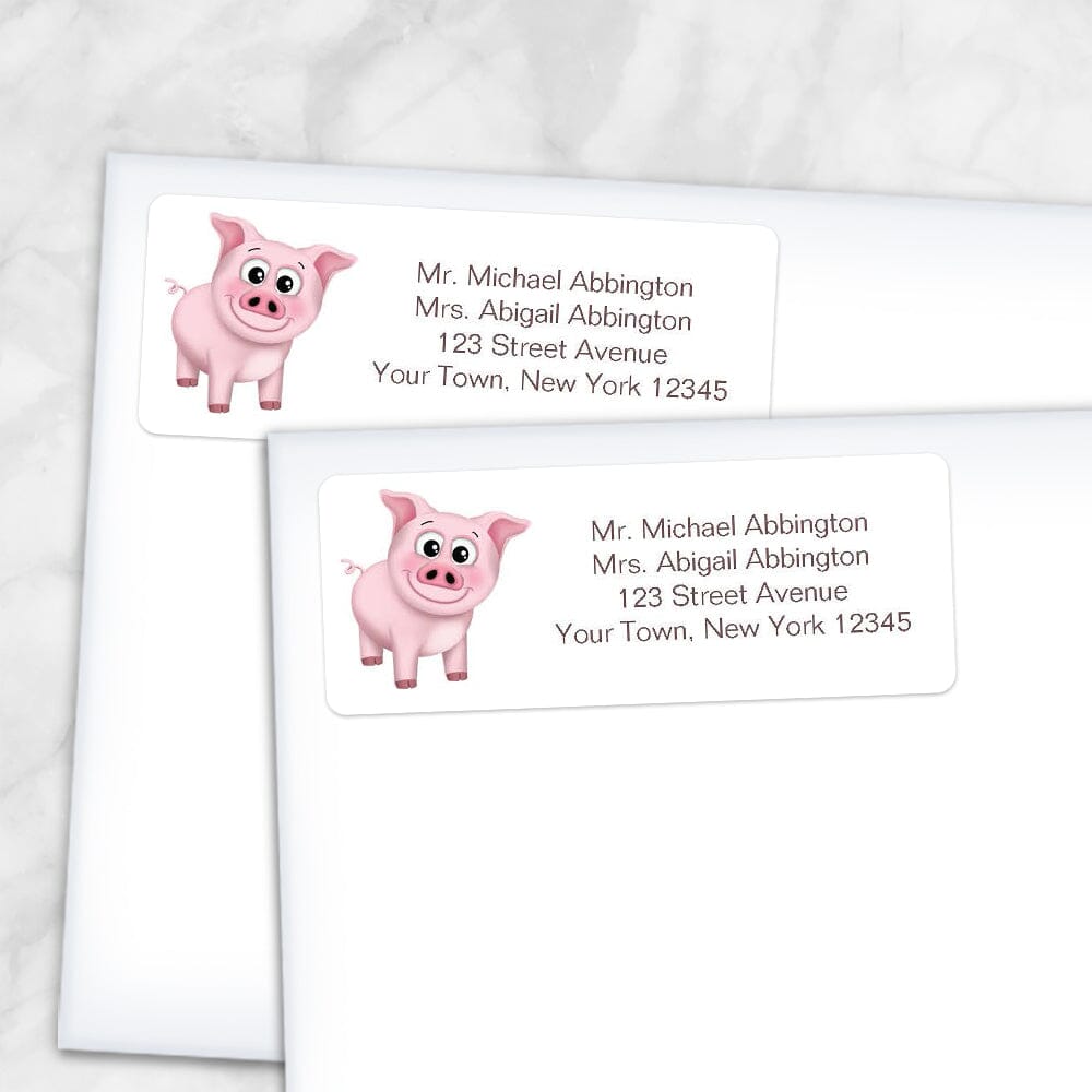 Printable Cute Happy Pink Pig Address Labels at Printable Planning. Shown on envelopes.