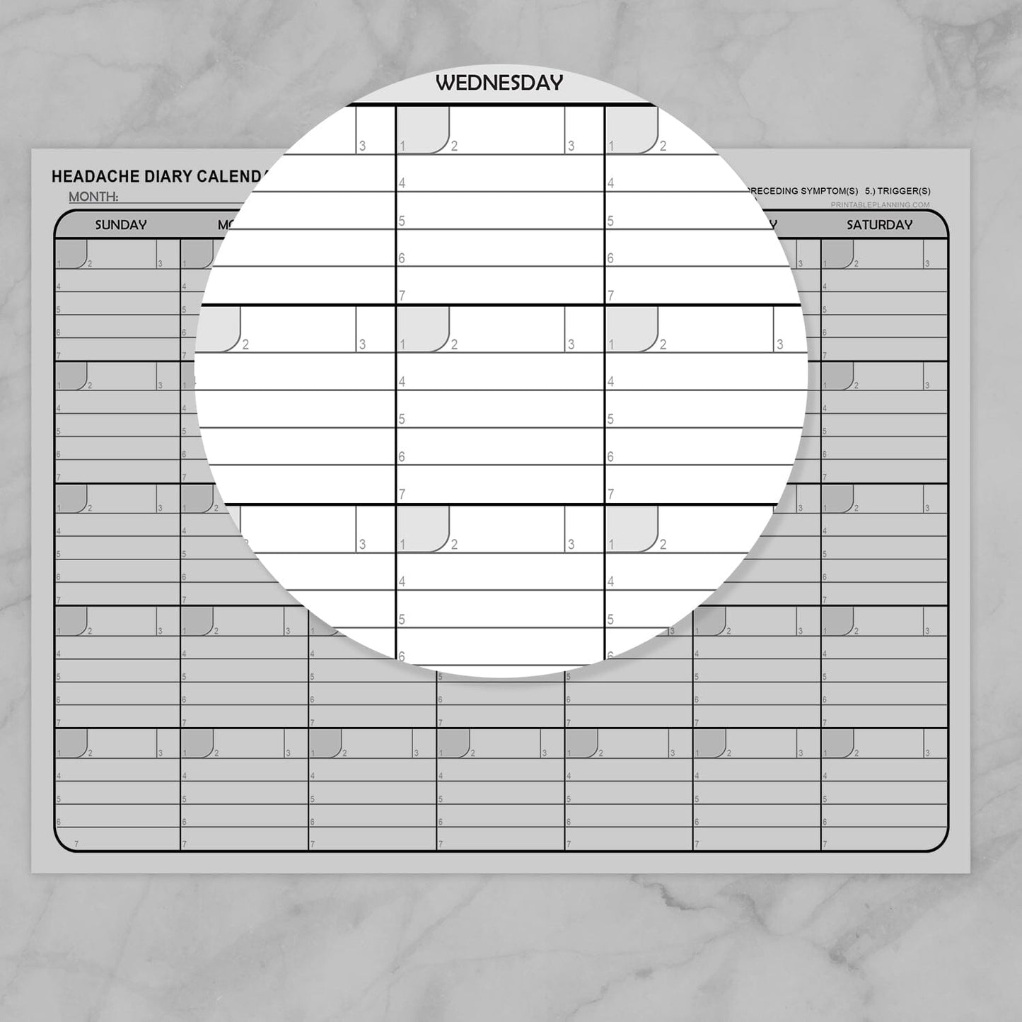 Headache Calendar or diary sheet with a focus on Wednesday, on a gray marble background.