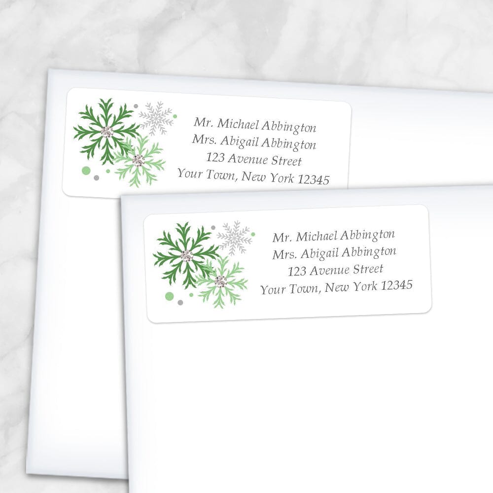 Printable Winter Green Gray Snowflake Address Labels at Printable Planning. Shown on envelopes.