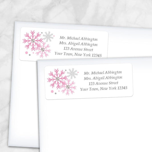 Printable Winter Pink Gray Snowflake Address Labels at Printable Planning. Shown on envelopes.