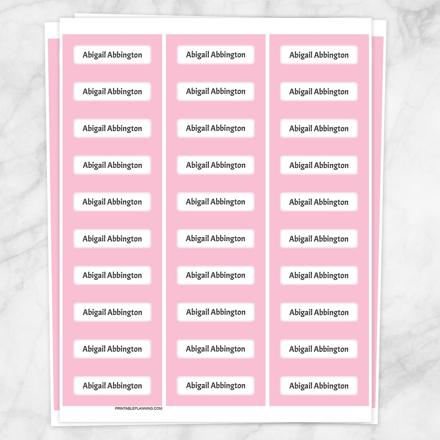 Printable Pink Border Name Labels for School Supplies at Printable Planning. Sheet of 30 labels.