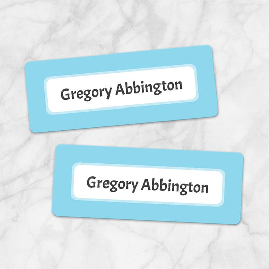Printable Blue Border Name Labels for School Supplies at Printable Planning. Example of 2 labels.