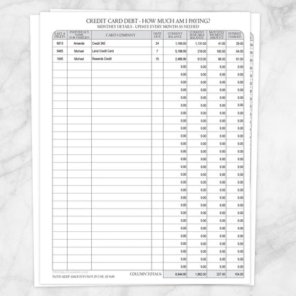Printable Credit Card Debt Tracker with Auto-Calculating Totals shown on a marble surface.