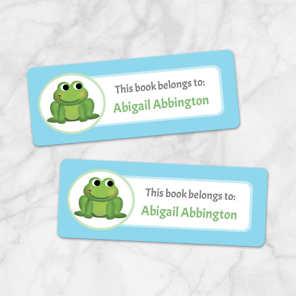 Printable Cute Frog Blue Bookplate Labels for Name Labeling Books at Printable Planning. Example of 2 labels.