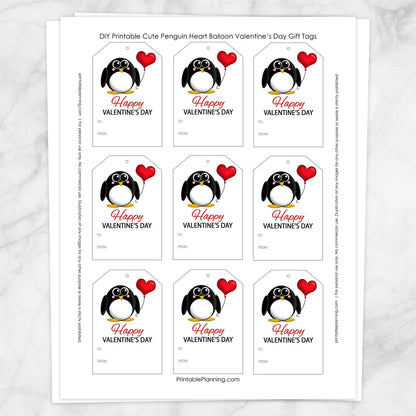 Printable Cute Penguin Heart Balloon Valentine's Day Gift Tags at Printable Planning. Sheet of 9 gift tags.