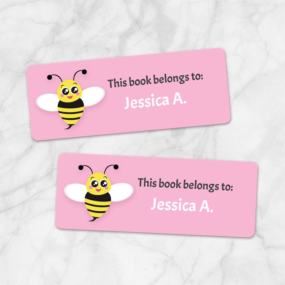 Printable Cute Pink Bee Bookplate Labels for Name Labeling Books at Printable Planning. Example of 2 labels.