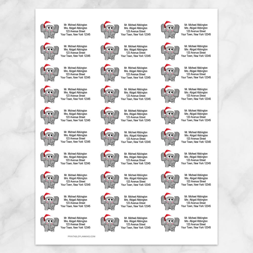 Printable Cute Santa Hat Elephant Address Labels at Printable Planning. Sheet of 30 labels.
