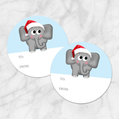 Printable Cute Santa Hat Elephant Gift Tag Stickers at Printable Planning. Example of 2 stickers.