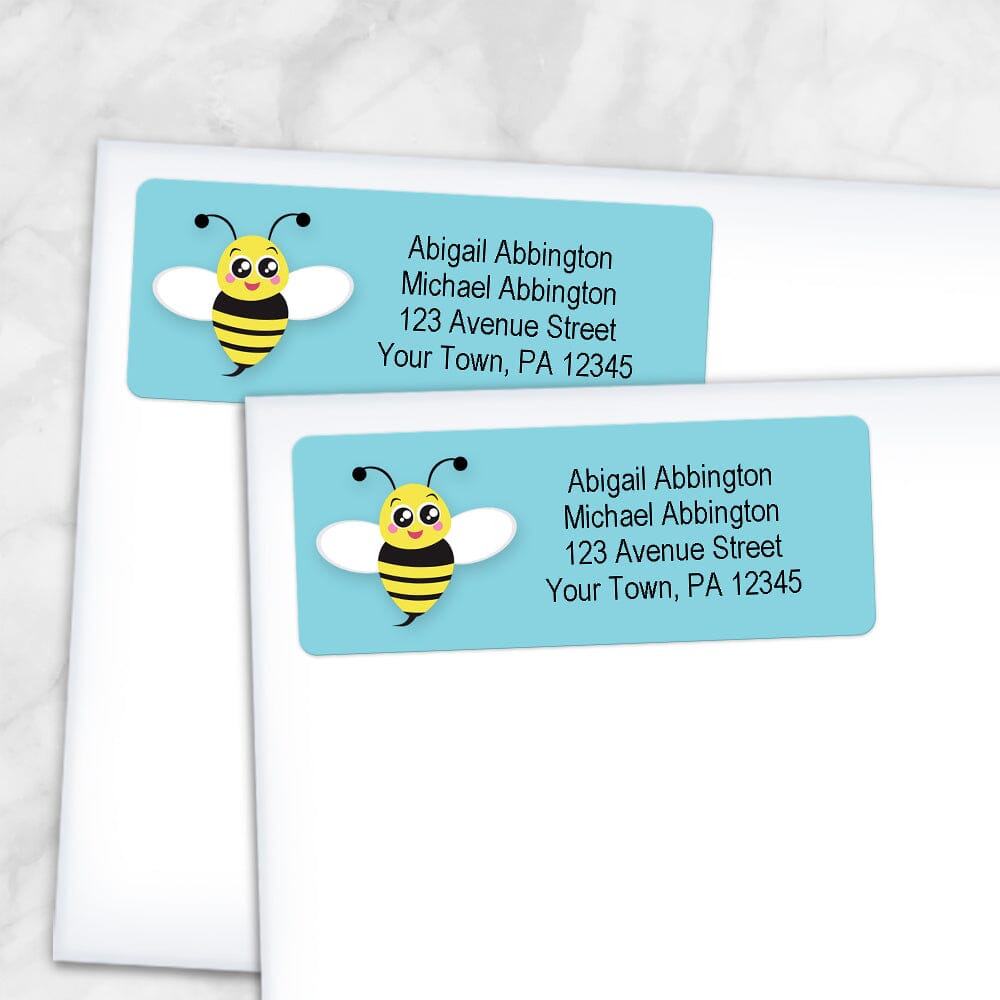 Printable Cute Turquoise Bee Address Labels at Printable Planning. Shown on envelopes.