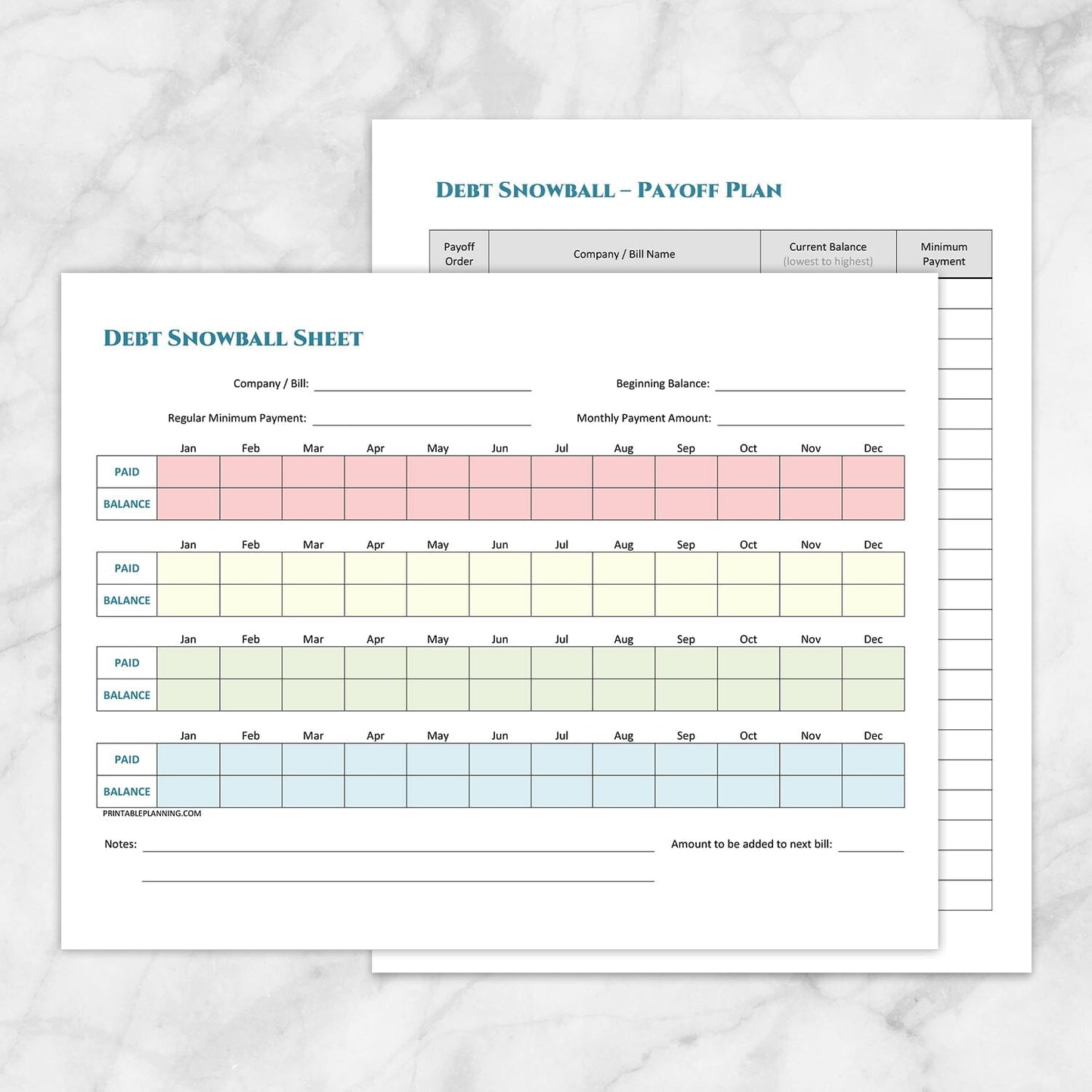 The printable Debt Snowball Tracker & Debt Payoff Plan Bundle pages shown on a marble surface.