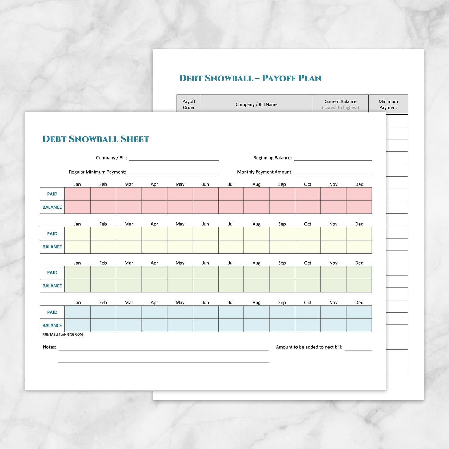 The printable Debt Snowball Tracker & Debt Payoff Plan Bundle pages shown on a marble surface.