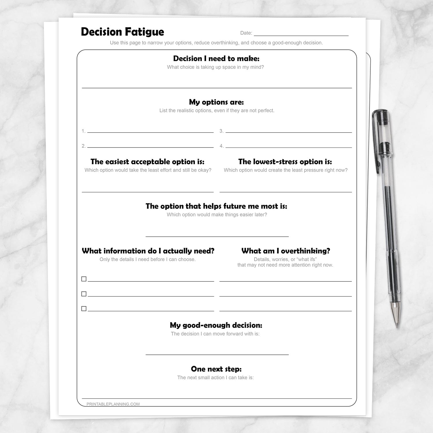 Decision Fatigue Printable Worksheet shown on a marble surface with a pen.