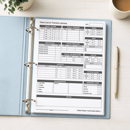 Elderly Daily Care Sheet with Alertness & Housekeeping (printable page) shown in a light blue binder on a desk with a plant, coffee, and a pen.