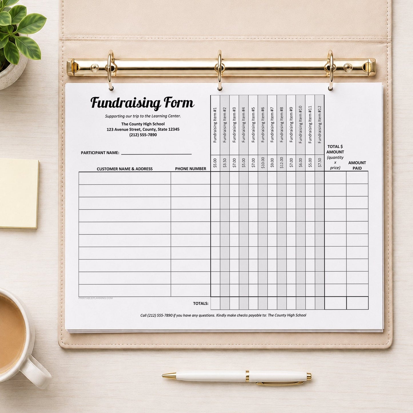 A Fundraiser Order Form with 12 Item Columns printed on a white sheet, displayed in a beige ring binder with gold rings on a light wood desk. The scene is styled with a coffee cup, sticky note, plant, and pen.