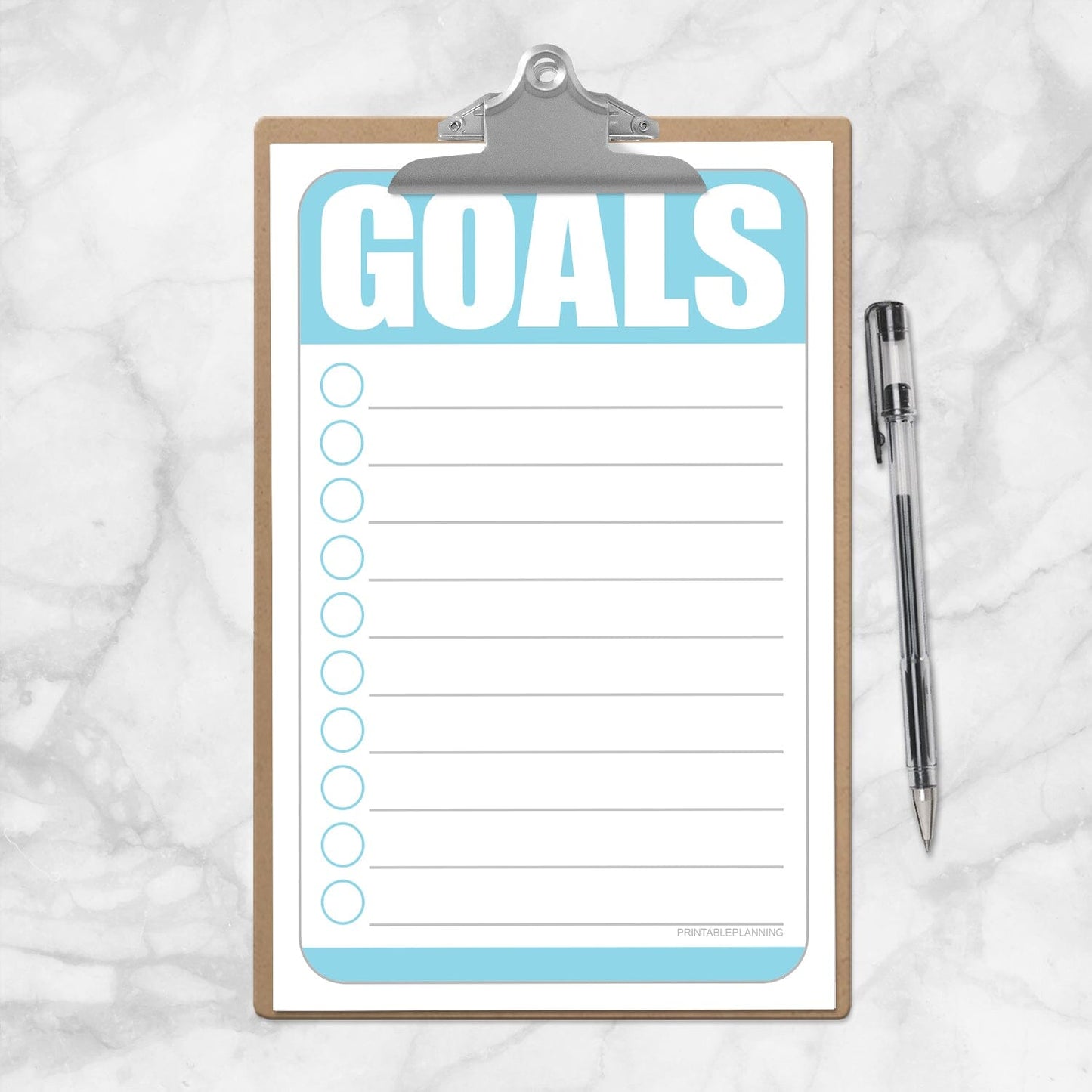Printable Goals - Blue Half Page Checklist at Printable Planning. Photo shows the half page checklist on a mini clipboard.