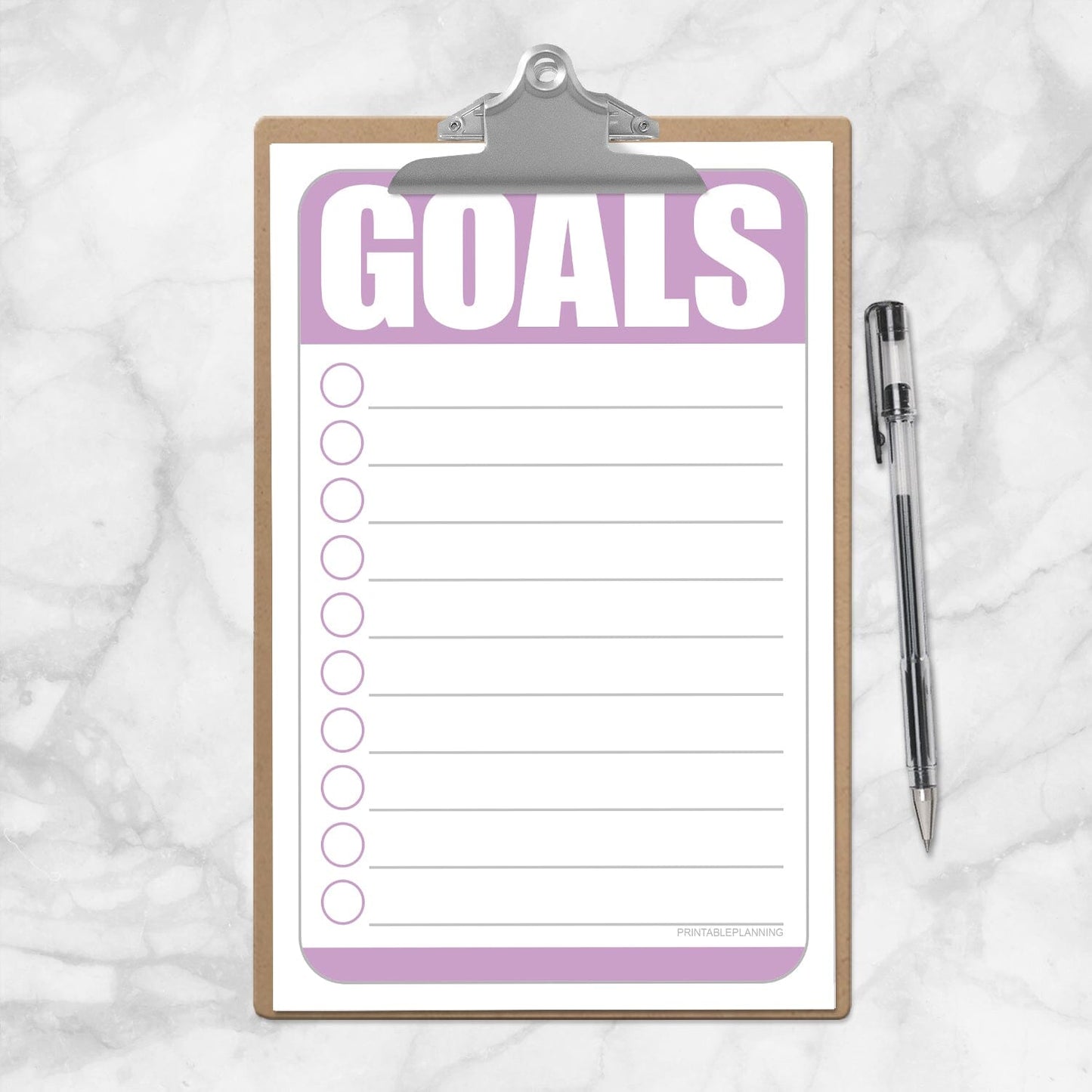 Printable Goals - Purple Half Page Checklist at Printable Planning. Photo shows half size page on mini clipboard.