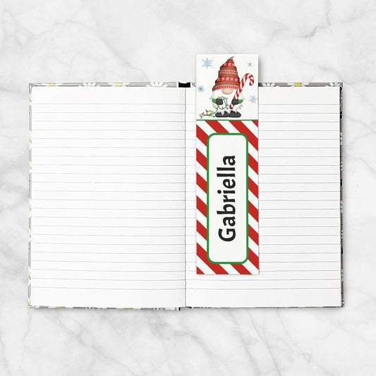A Personalized Holiday Candy Cane Gnome Bookmark in a blank 5x7 book as an example.