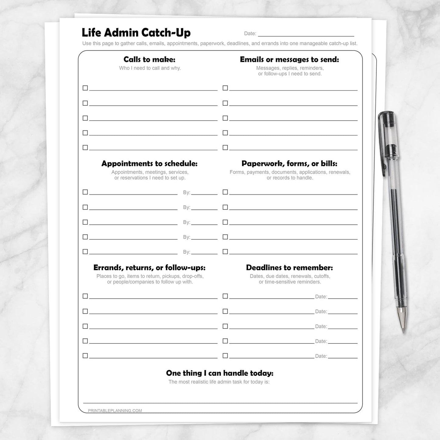 Life Admin Catch-Up Printable Planner Page shown on a marble surface with a pen.