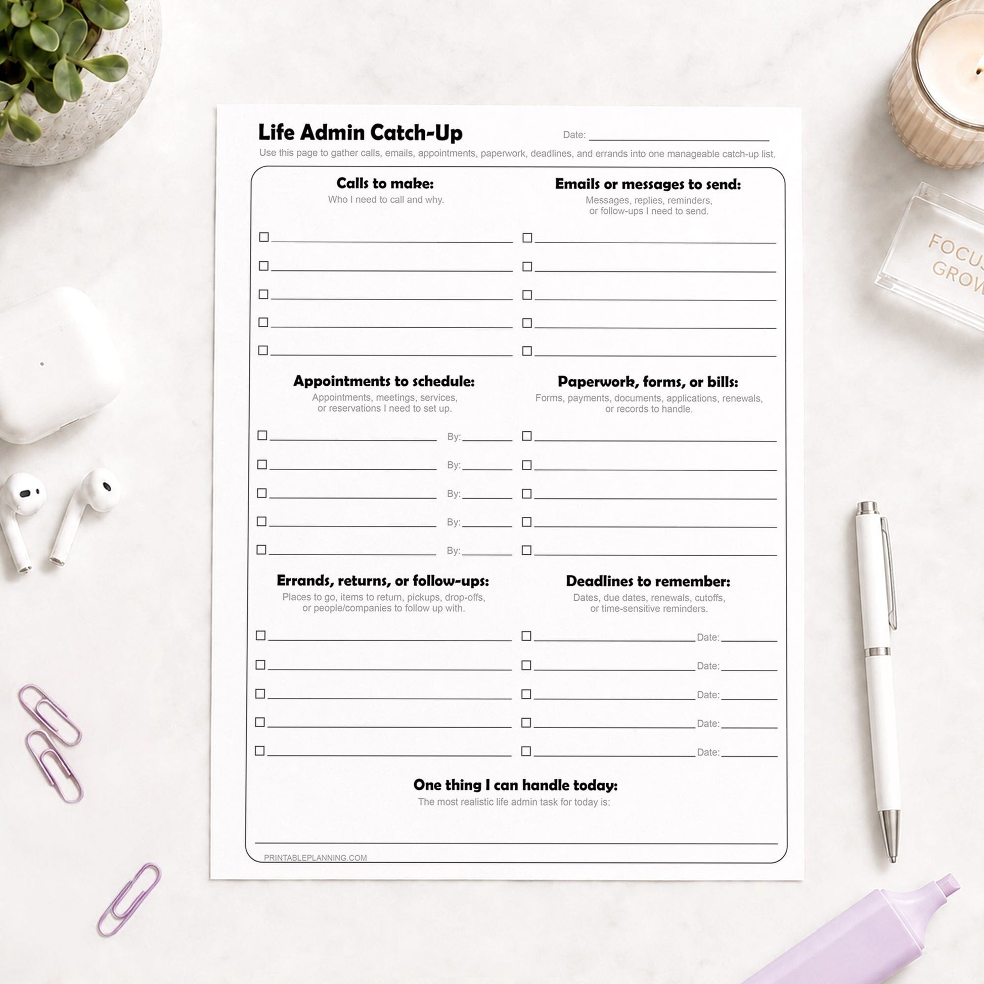 Life Admin Catch-Up Printable Planner Page on a light desk with a pen, highlighter, paperclips, and plant.