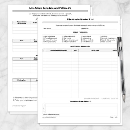 The printable Life Admin Master List and Follow-Up Tracker (2 Pages) shown on a marble surface with a pen.