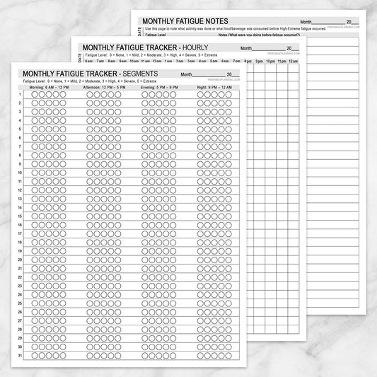 Three printable fatigue tracking sheets laid out on a light marble background: a large monthly fatigue tracker with hourly and segment rows, a monthly fatigue tracker hourly page, and a monthly fatigue notes page.