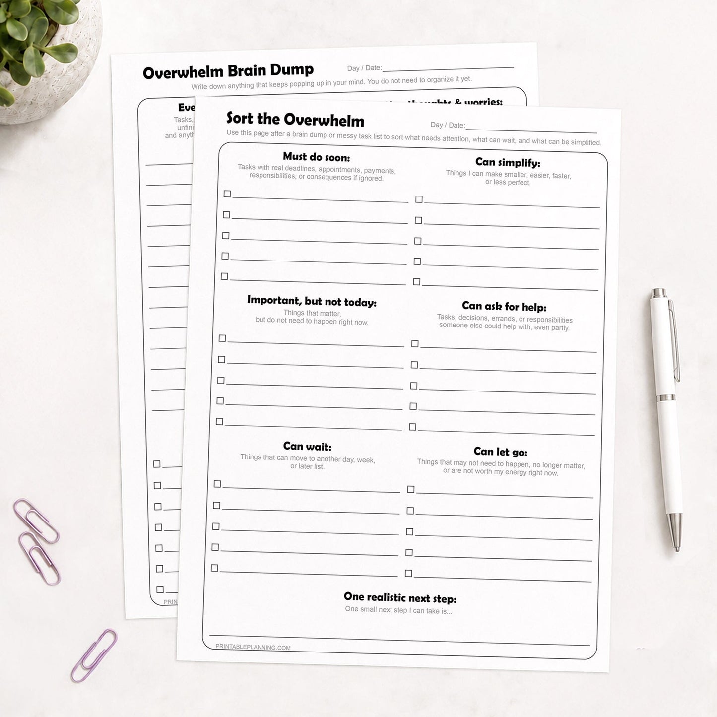Overwhelm Brain Dump and Task Organizer Printable Worksheets (Bundle) shown on a light desk with a pen, paperclips, and a plant.