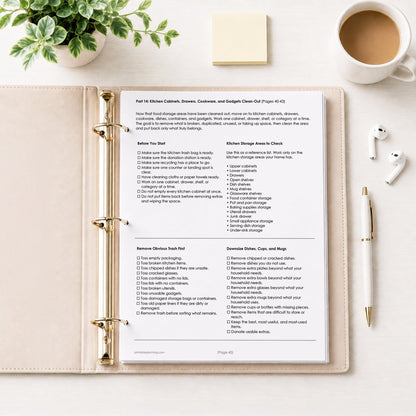 Printed page #40 of the Overwhelming Mess Clean-Up Checklist in a beige binder on a table with a plant, notes, coffee, earbuds, and a pen.