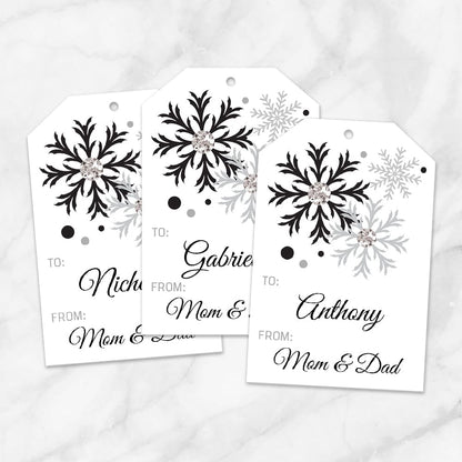 Printable Snowflake Personalized Gift Tags in Black at Printable Planning. Example of 3 gift tags.