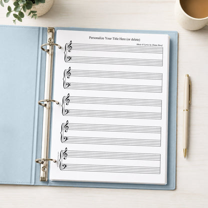 Personalized Blank Piano and Vocals Sheet Music shown in a light blue binder on a desk with a plant, coffee, and a pen.