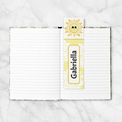 A Personalized Happy Sun Bookmark in a blank 5x7 book as an example.