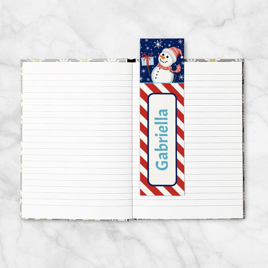 A Personalized Winter Snowman Bookmark in a blank 5x7 book as an example.