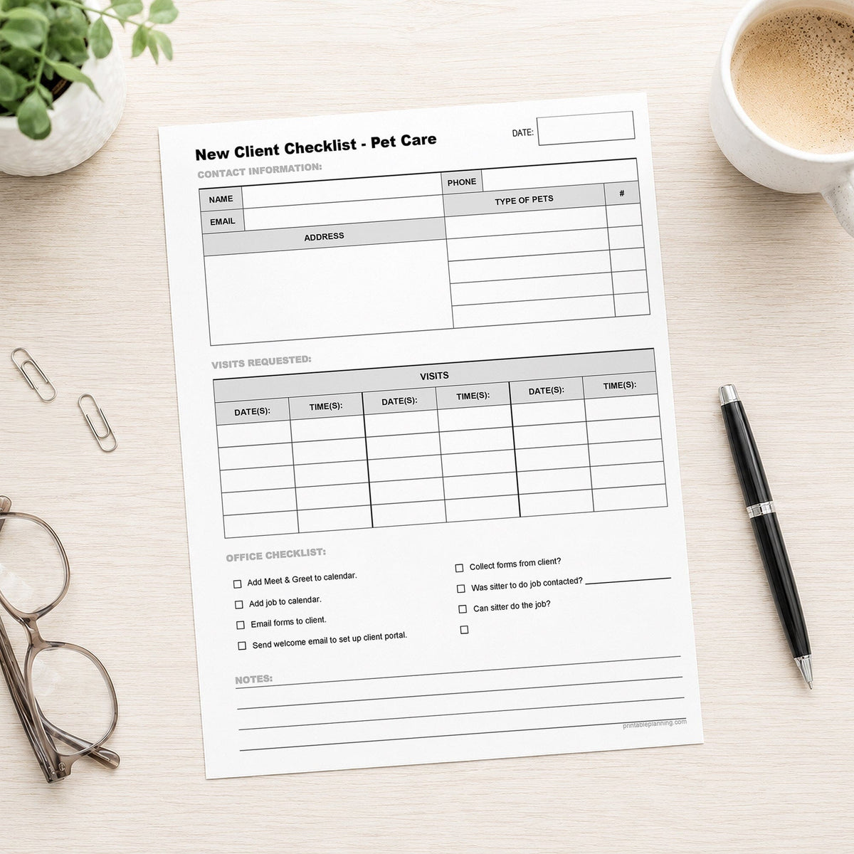 A printed Pet Sitter New Client Checklist with Visit Schedule (printable page) shown on a desk with a plant, glasses, paperclips, coffee, and a pen.