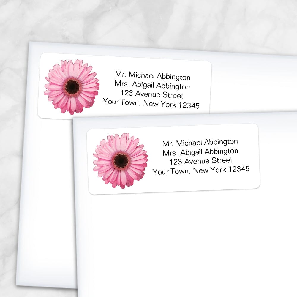 Printable Pretty Personalized Pink Daisy Address Labels at Printable Planning. Shown on envelopes.