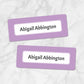 Printable Purple Border Name Labels for School Supplies at Printable Planning. Example of 2 labels.