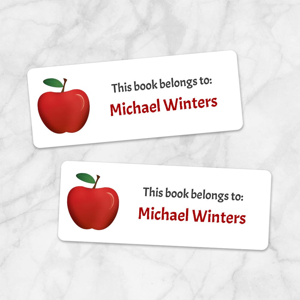 Printable Red Apple Bookplate Labels for Name Labeling Books at Printable Planning. Example of 2 labels.