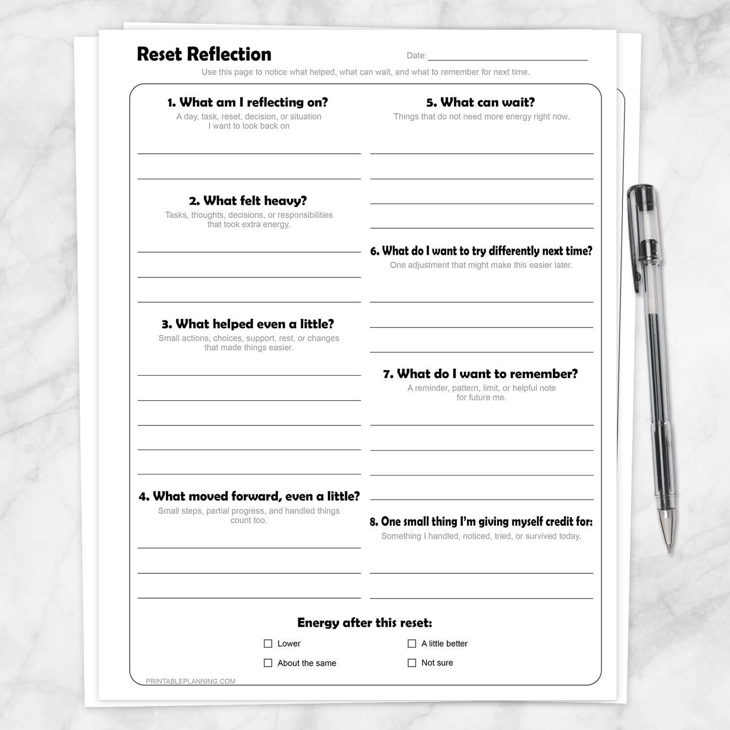 Reset Reflection Printable Worksheet shown on a marble surface with a pen.