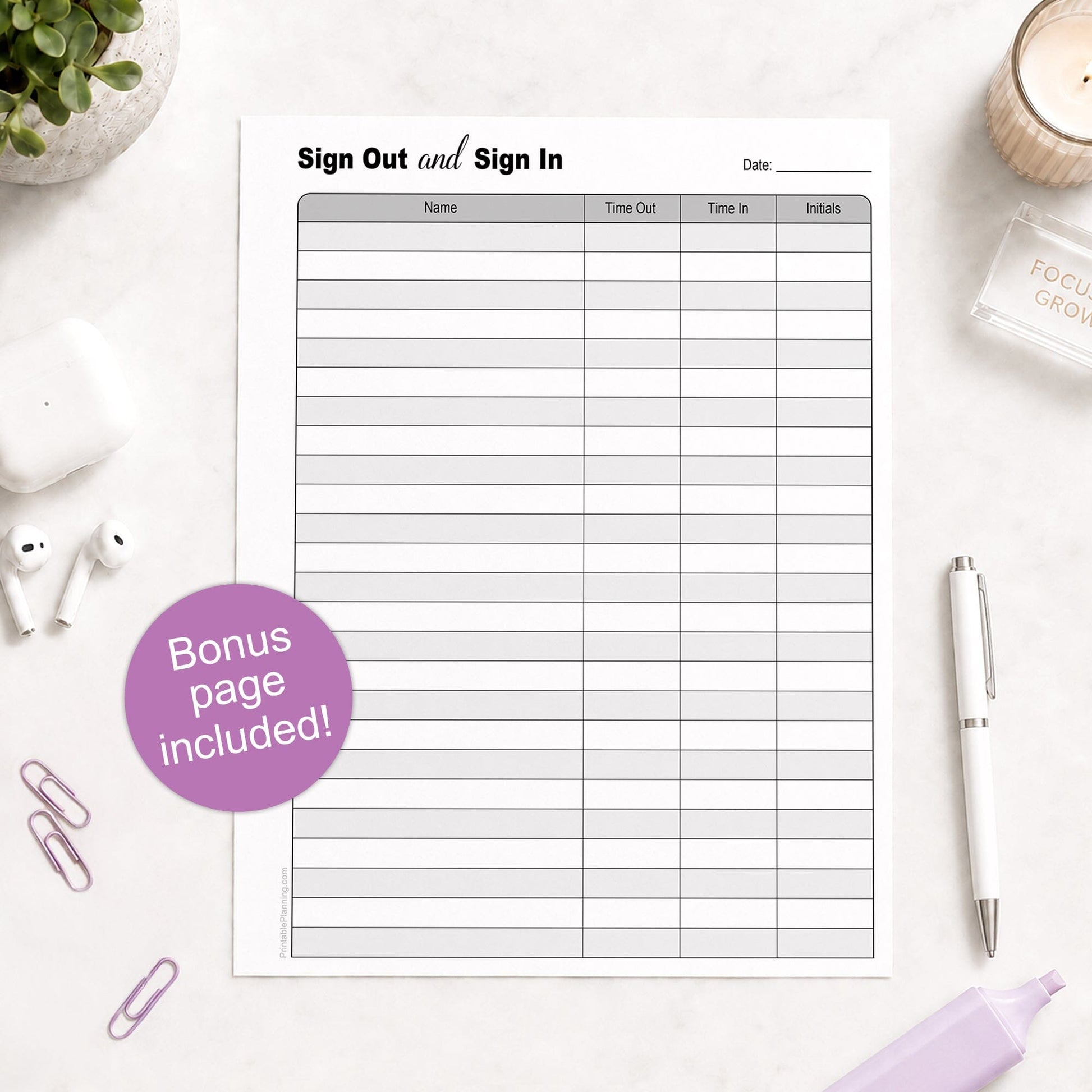 A printed Sign Out and Sign In page, a bonus page included with your order, shown on a desk with a plant, earbuds, paperclips, highlighter, and a pen.