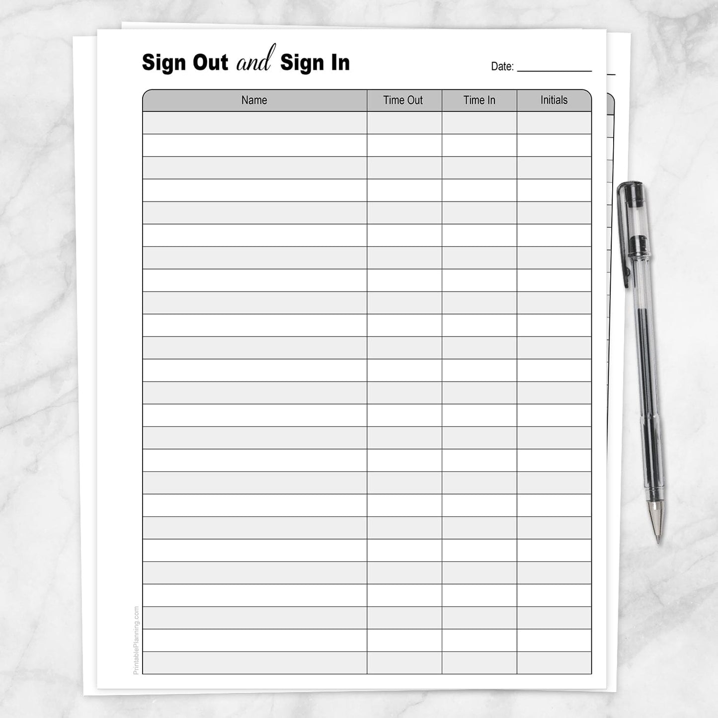 The printable Sign Out and Sign In Sheet shown on a marble surface with a pen.