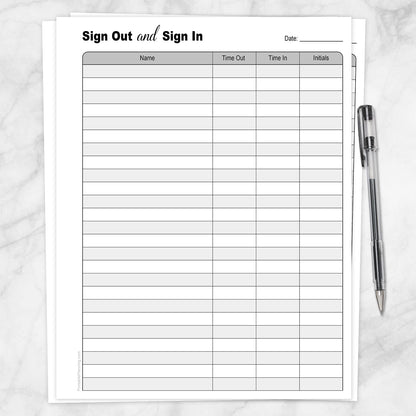 The printable Sign Out and Sign In Sheet shown on a marble surface with a pen.