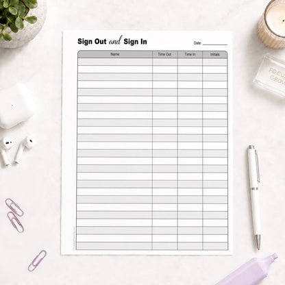 The printed Sign Out and Sign In Sheet (printable page) shown on a desk with a plant, earbuds, paperclips, highlighter, and a pen.