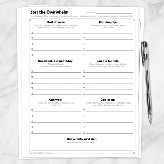 Sort the Overwhelm Printable Task Organizer shown on a marble surface with a pen.