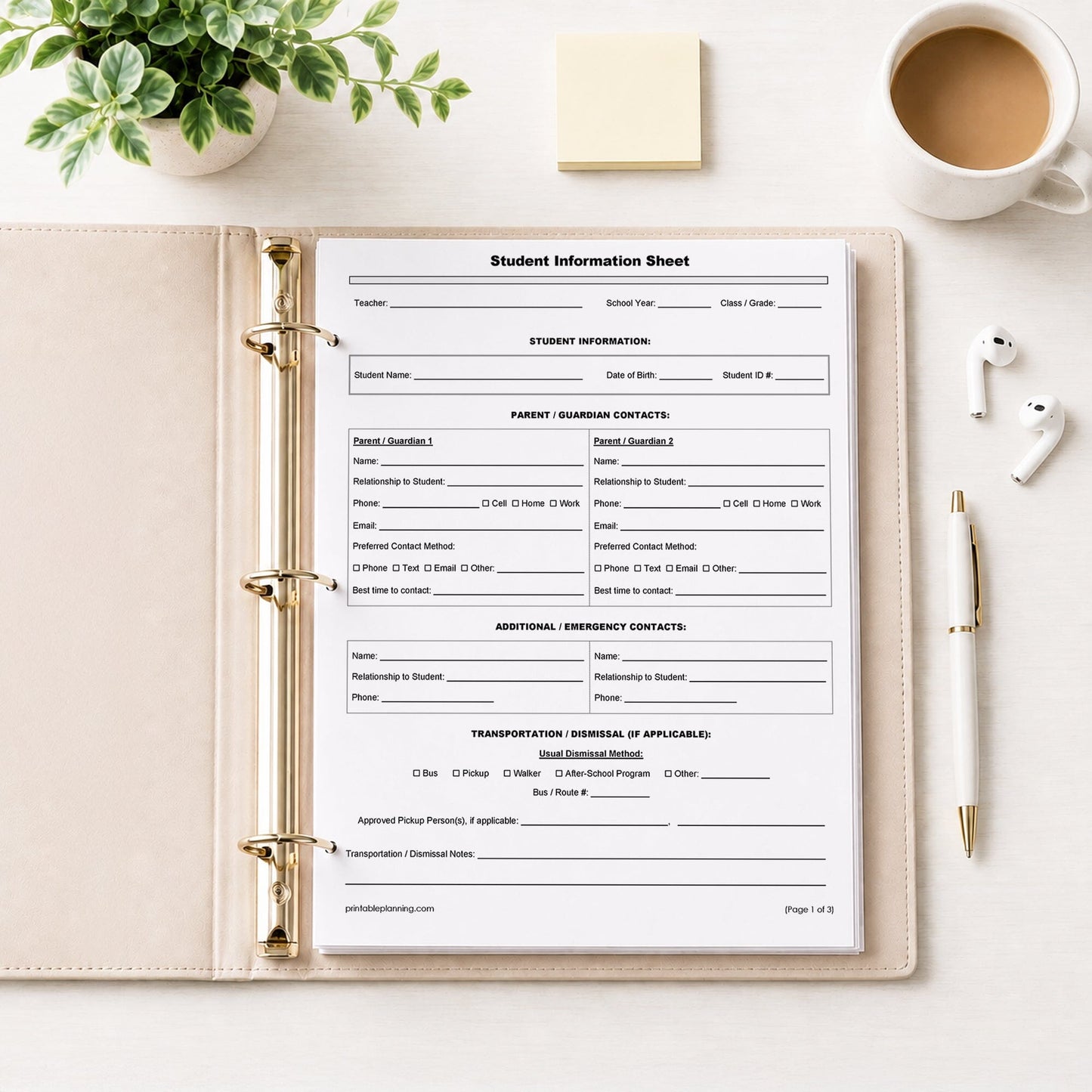 The printed 1st page of the Student Information Sheet and Parent Contact Log, the Student Information Sheet, shown in a beige binder on a table with a plant, sticky notes, coffee, earbuds, and a pen.