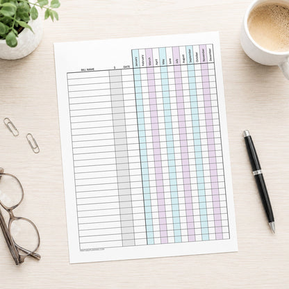 Turquoise Purple Yearly Bill Payment Tracker with Amount Column (printable page) shown on a desk with a plant, glasses, coffee, paperclips, and a pen.