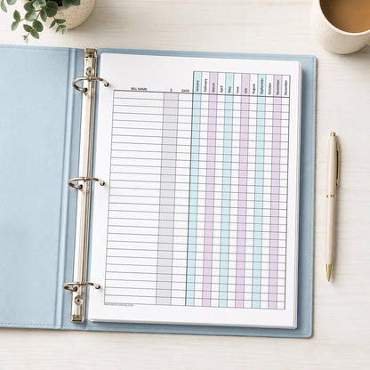 Turquoise Purple Yearly Bill Payment Tracker with Amount Column (printable page) shown in a light blue binder on a desk with a plant, coffee, and a pen.