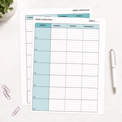 Printed front and back Turquoise Weekly Lesson Plan Pages for Teachers pages shown on a table with a plant, paperclips, and a pen.