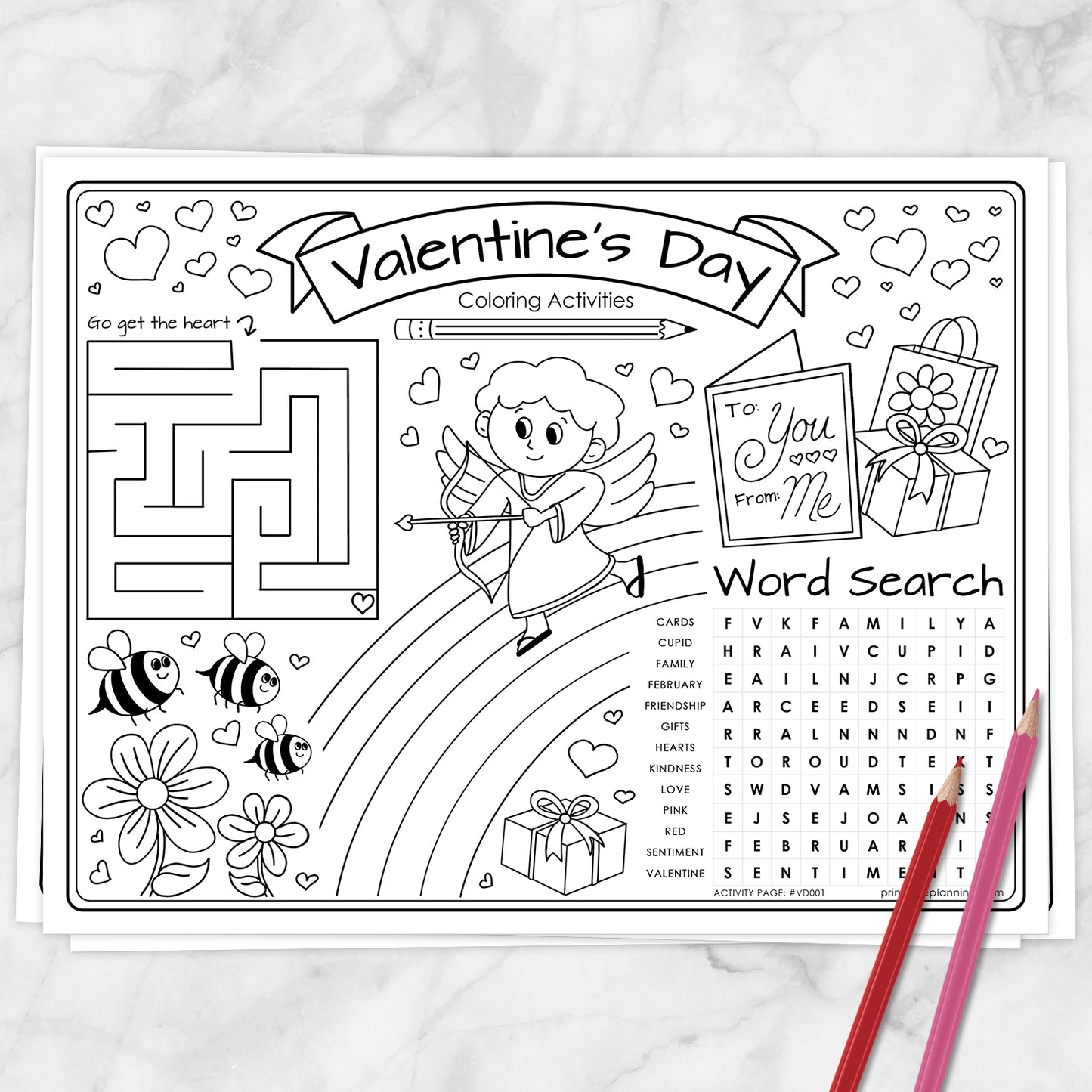 A Valentine's Day coloring activities sheet with black line art on white paper, featuring a maze, cartoon cupid, flowers, bees, a 'To You from Me' card, gift box, word search, and two colored pencils on a light marble surface.