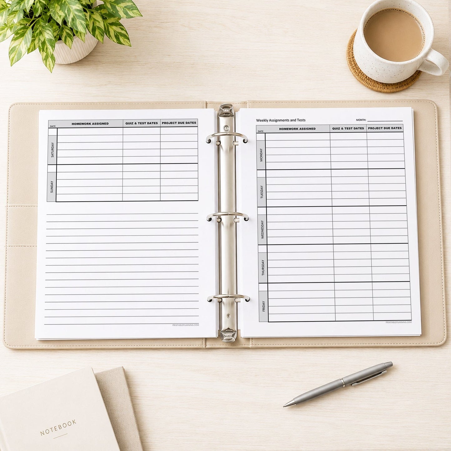 Two printed Weekly Student Assignment Tracker for Homework, Tests & Projects (printable pages) shown on both sides in an open beige binder on a desk with a plant, coffee, notebooks, and a pen.