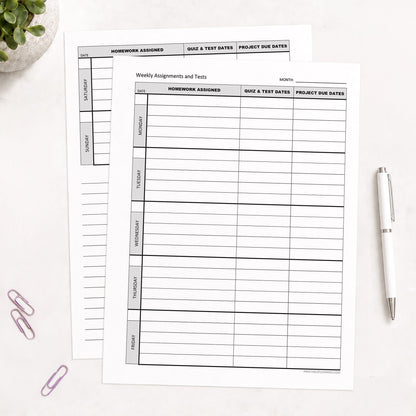 Two front and back printed Weekly Student Assignment Tracker for Homework, Tests & Projects (printable) pages shown on a desk with a plant, paperclips, and a pen.