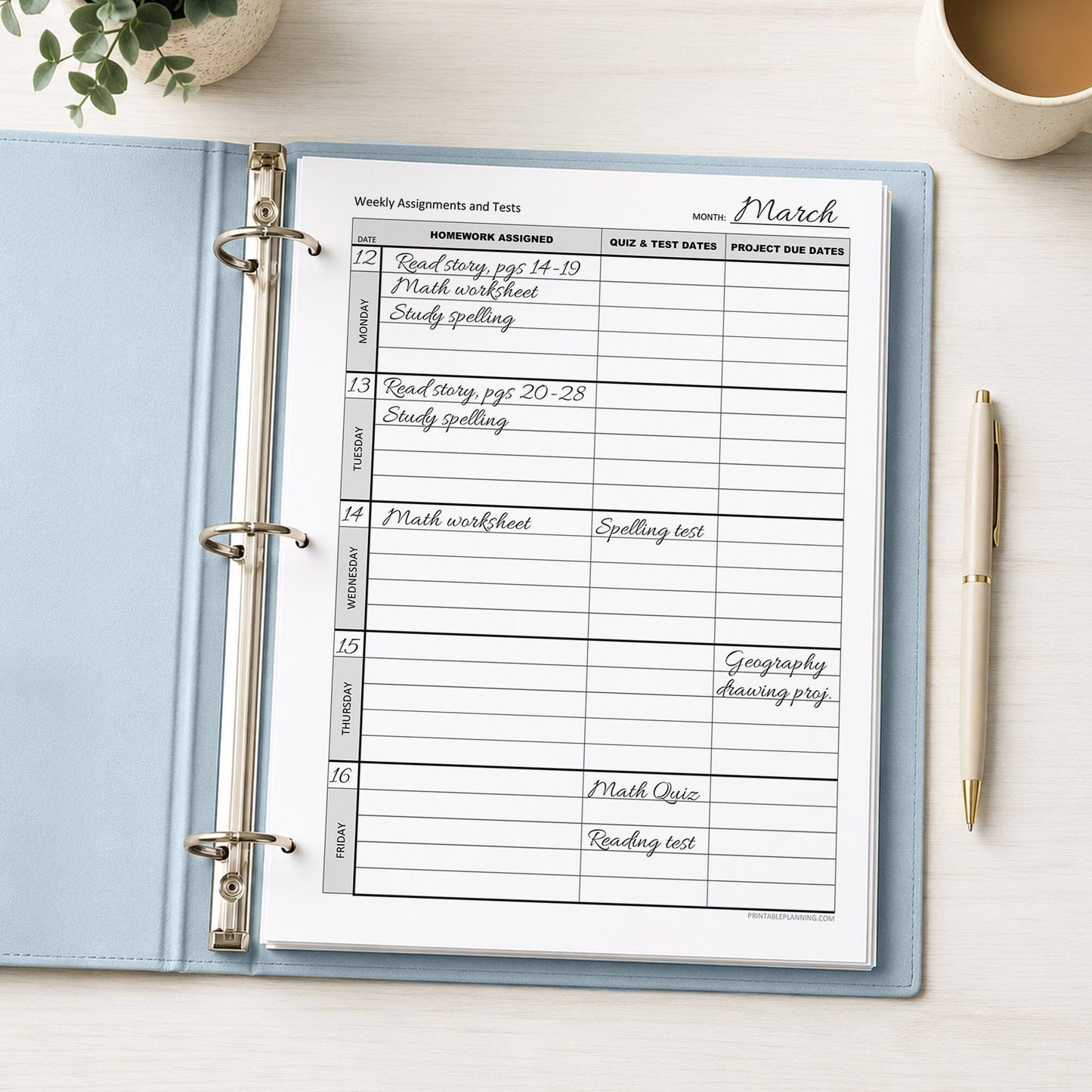 A printed Weekly Student Assignment Tracker for Homework, Tests & Projects (printable page), with example writing, shown in a light blue binder on a desk with a plant, coffee, and a pen.
